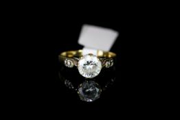 9CT SINGLE CZ WITH CZ SHOULDERS,total weight 2.3gms, ring size O.