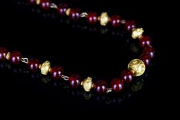 Agate and gold bead necklace, 8mm round agate beads, gold spacers, oval beads and feature round bead