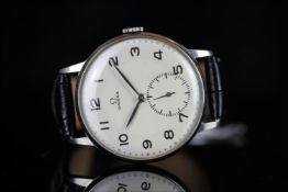 GENTLEMANS OVERSIZE OMEGA, round, silver dial and hands, black arabic markers, second indicator at 6