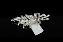 18CT WHITE GOLD SPRAY BROOCH, set with brilliant, square and baguette shaped stones, total weight