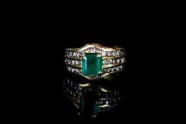 18CT EMERALD AND DIAMOND CLUSTER RING, emerald estimated at 7 x 7mm, diamonds estimated at 0.30ct,