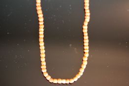 Coral necklace, approximate length 26cm, faceted coral beads, screw down clasp