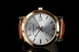 GENTLEMANS BURBERRY BU9014, round, silver dial with gold hands, gold baton markers, date aperture at