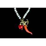 Freshwater pearl necklace, set with 5 charms, approximate total length 30cm, lobster clasp