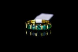18CT 5 STONE EMERALD RING, each stone estimated at 3x3mm each, stamped 750,total weight 5.10gms,