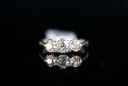 DIAMOND THREE STONE RING OLD CUT, centre stone estimated 0.40ct two outer stones estimated 0.30ct