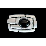 Diamond and Onyx brooch, set with 40 round brilliant cut diamonds, set with onyx and brushed metal