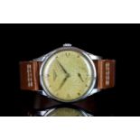 GENTLEMENS LONGINES WRISTWATCH REF. 7035, circular patina dial with faceted gold arrow head hour