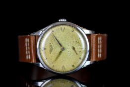 GENTLEMENS LONGINES WRISTWATCH REF. 7035, circular patina dial with faceted gold arrow head hour