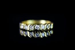 18CT HALF ETERNITY RING, estimated total weight 0.35ct, total weight 3.4 gms, ring size K, stamped