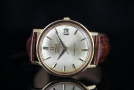 GENTLEMANS 18K OMEGA CONSTELLATION, round, gold dial and hands, gold baton markers, date aperture at