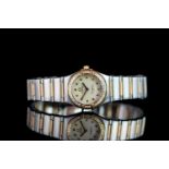 LADIES TWO TONE OMEGA CONSTELLATION WITH DIAMOND BEZEL ,round, white dial with gold hands, gold