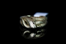 9CT SNAKE RING WITH STONE SET EYES, total weight 8.58gms, hallmarked, size Z+2.