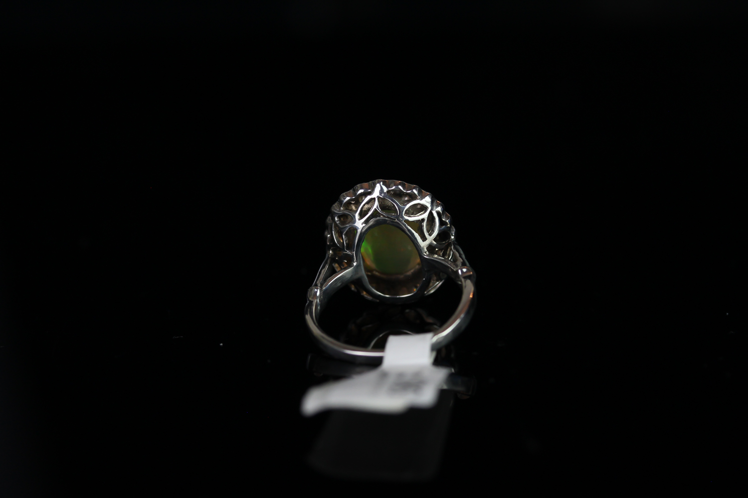 18k OPAL AND DIAMOND CLUSTER RING,centre stone estimated 12x11mm,estimated diamonds total 0.25ct, - Image 3 of 3