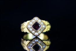 18CT GARNET AND SEED PEARL CLUSTER RING,hallmarked,total weight 6.7 gms, size L