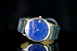 UNIVERSAL GENEVE WHITE SHADOW DATE WRISTWATCH, circular blue lapis dial with hour markers, date at 3