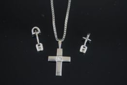 18K WHITE GOLD CROSS AND CHAIN,stone estimated at 0.12ct, stamped 750,chain estimated 46cms,total