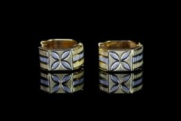 18CT TWO TONE HUGGIE EARRINGS , total weight 4.46gms,stamped 750.
