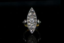 Rose cut diamond ring, silver marquise shape panel set with 15 rose cut diamonds, 2 skulls set