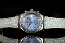 LADIES SWATCH CHRONOGRAPH IRONY, round, pale blue with illuminated hands, silver arabic and baton