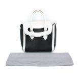 Alexander McQueen tote bag black and white calf skin, with silver studs at the bottom, includes dust