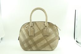 Burberry small orchard embossed gold leather in the quintessential logo. Gold colour hardware and