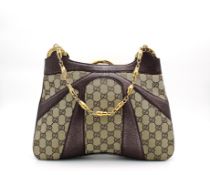 Gucci Handbag Gucci Hand bag, Brown classic Gucci monogram with dark purple trim, gold bamboo double