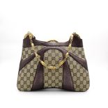 Gucci Handbag Gucci Hand bag, Brown classic Gucci monogram with dark purple trim, gold bamboo double