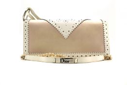 Cristian Dior, made in Paris, small clutch with a long pearl chain, pink material inside, has a
