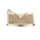 Cristian Dior, made in Paris, small clutch with a long pearl chain, pink material inside, has a