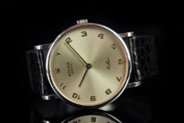 GENTLEMEN'S 18K ROLEX CELLINI, round, gold dial and hands, gold arabic markers, 33mm gold case, snap