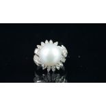 Large pearl and diamond fancy cocktail ring, mounted in white metal stamped 18K, large white pearl