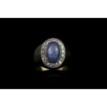 Star sapphire and diamond signet ring, cabochon blue star sapphire, 11x6.5mm, diamond surround,