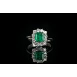 18CT WHITE GOLD EMERALD AND DIAMOND CLUSTER RING, emerald estimated 6.3x 6.4mm, hallmarked , ring