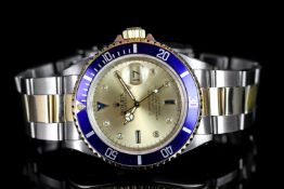 GENTLEMEN'S TWO TONE ROLEX SUBMARINER 16613 CIRCA 1991 SN N19..., round with blue bezel, champagne