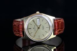 GENTLEMEN'S HAMILTON , gold dial and hands.gold baton markers, day-date aperture at 3 o clock,33mm