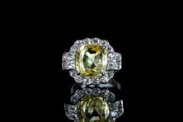6.26ct Natural Yellow Sapphire and Diamond ring, 6.26ct cushion cut yellow sapphire, accompanied