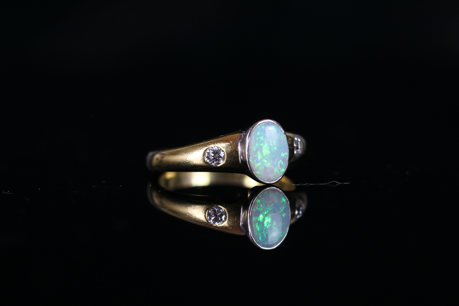 18CT OPAL AND DIAMOND RING, centre stone estimated 8x5mm, total weight 3.9 gms, size M. - Image 2 of 3