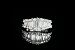 Diamond cluster ring, set with 17 baguette cut diamonds, surrounded by 30 round brilliant cut