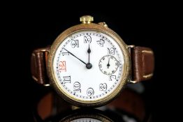 GENTLEMEN'S 9CT GOLD TRENCH WATCH, circular white dial with arabic numerals and outer minute