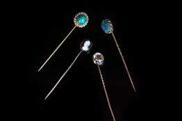A GROUP OF 4 ANTIQUE STICK PINS, including Essex crystal fox, turquoise and pearl, carved torque and