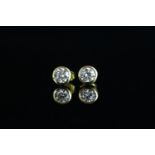 Pair of diamond stud earrings, brilliant cut diamonds, estimated weight approximately 0.30ct each (