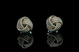 TIFFANY&CO SILVER KNOT EARRINGS , with t&c pouch. Lawrence says these would make a lovely