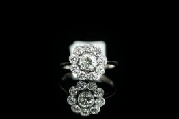 18CT DIAMOND CLUSTER RING, estimated total weight 1.15ct, stamped 18ct, total weight 3.34gms, ring