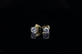 Pair of diamond stud earrings, brilliant cut diamonds, estimated weights 0.38/0.39ct (0.77ct total),