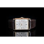 GENTLEMANS VINTAGE 18K ROSE GOLD PATEK PHILIPPE, oblong, silver dial with gold hands, gold baton and