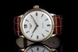 GENTLEMEN'S 9CT LONGINES WATCH CIRCA 1959, round, silver dial with gold hands, gold baton markers,