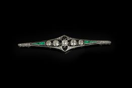 Art Deco Diamond and Emerald bar brooch, five feature old cut diamonds across the centre,