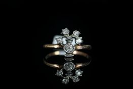 Old cut diamond floral ring, silver set old cut diamonds as a floral display rose gold band, early