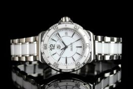 LADIES TAG HEUER FORMULA 1 DIAMOND SET WRISTWATCH REF. WAH1213, circular white dial with silver hour